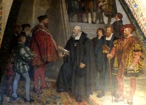 Kurfürst Moritz übergibt die Gründungsdokumente für St. Afra an den ersten Rektor der Fürstenschule.